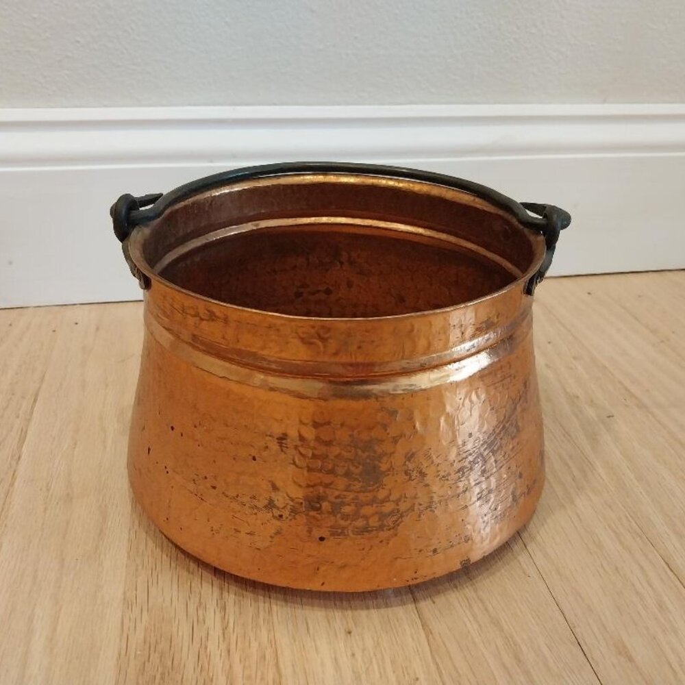 Antique handmade hammered copper pot with wrought iron handle